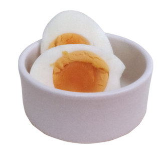 Boiled egg halves in dish